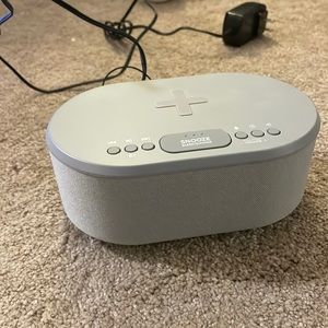 Phone charging alarm clock